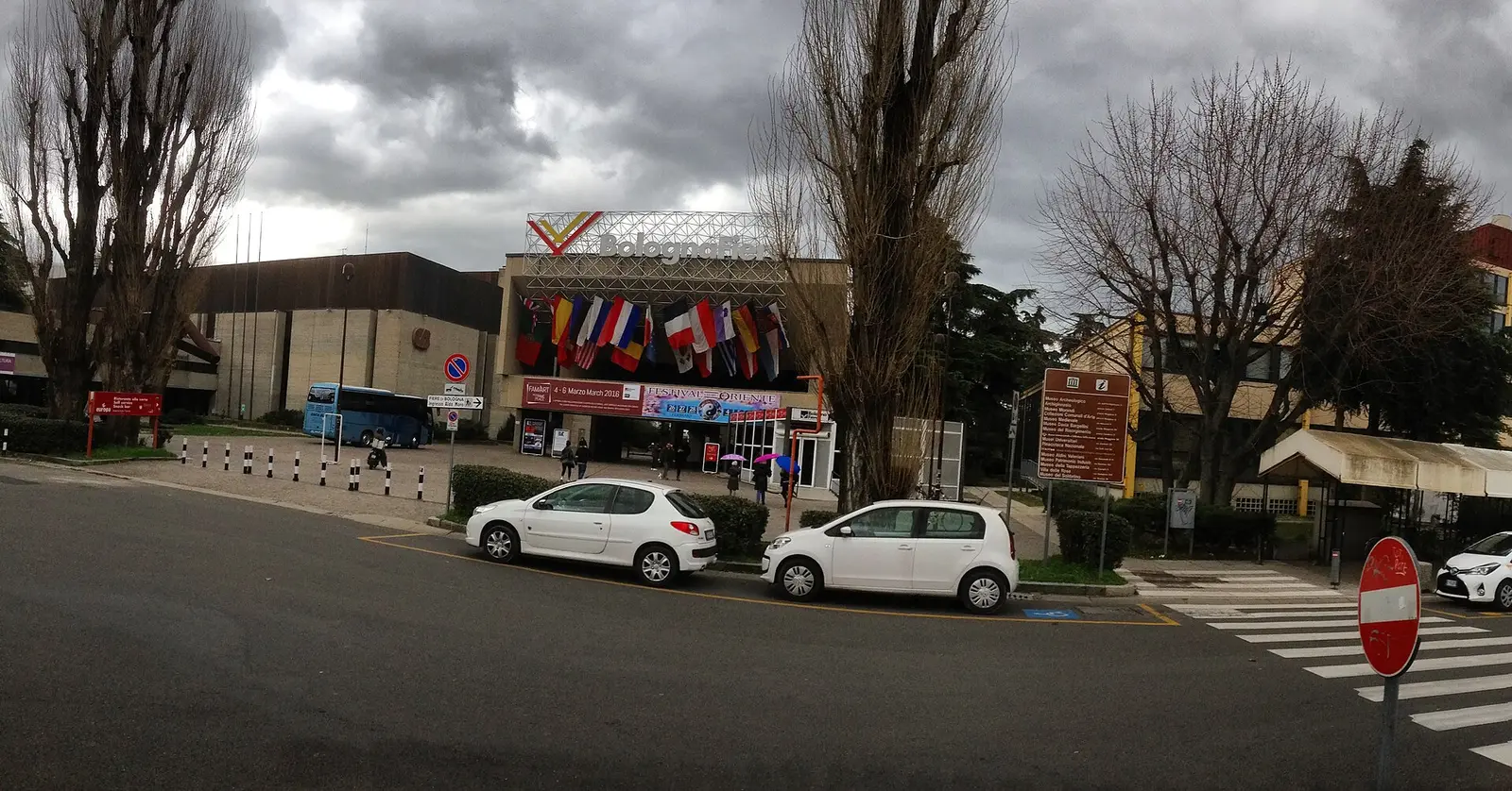 The entrance of the BolognaFiere exhibition centre with flags