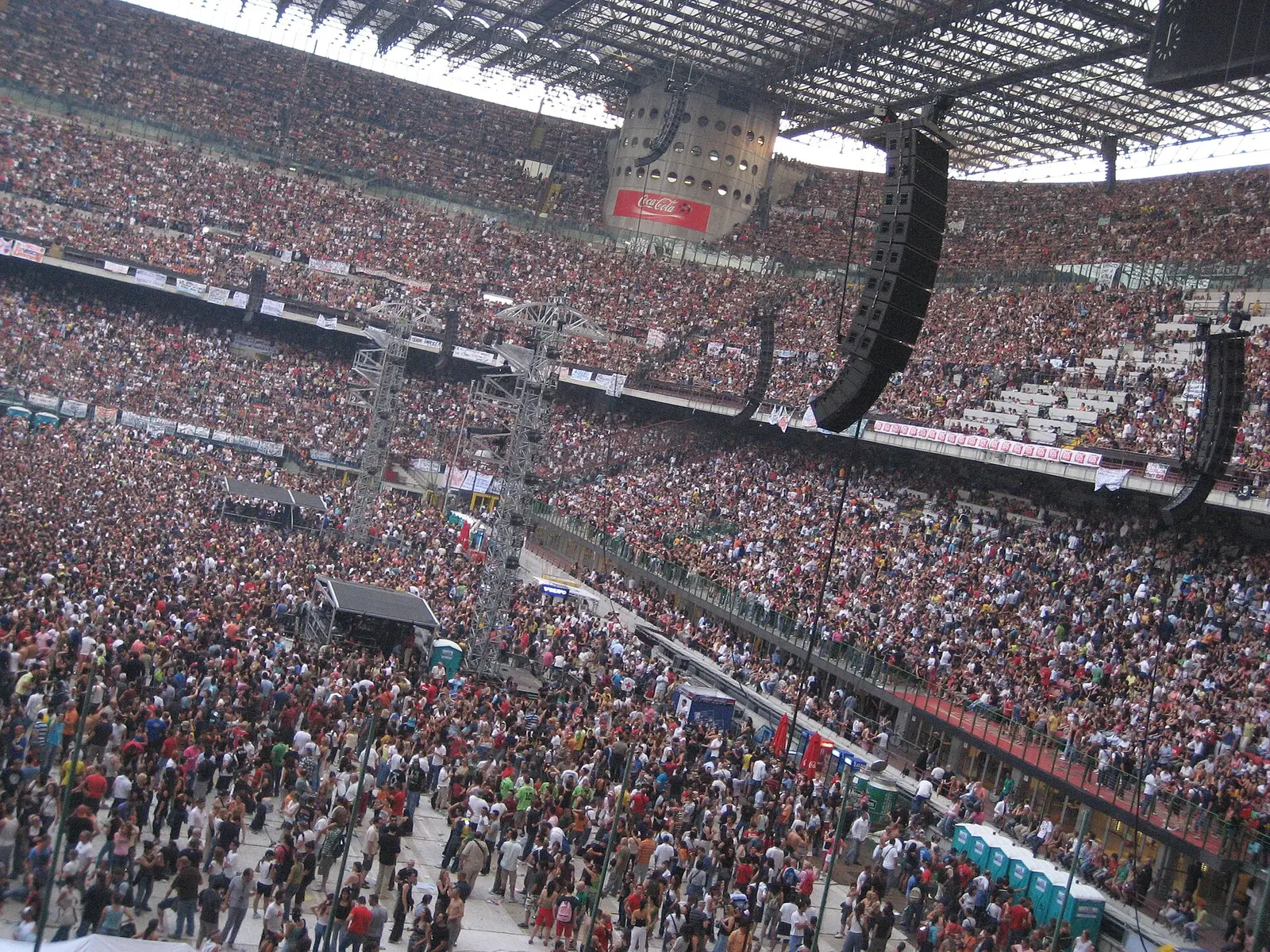 The tiers of San Siro stadium filled with a concert crowd